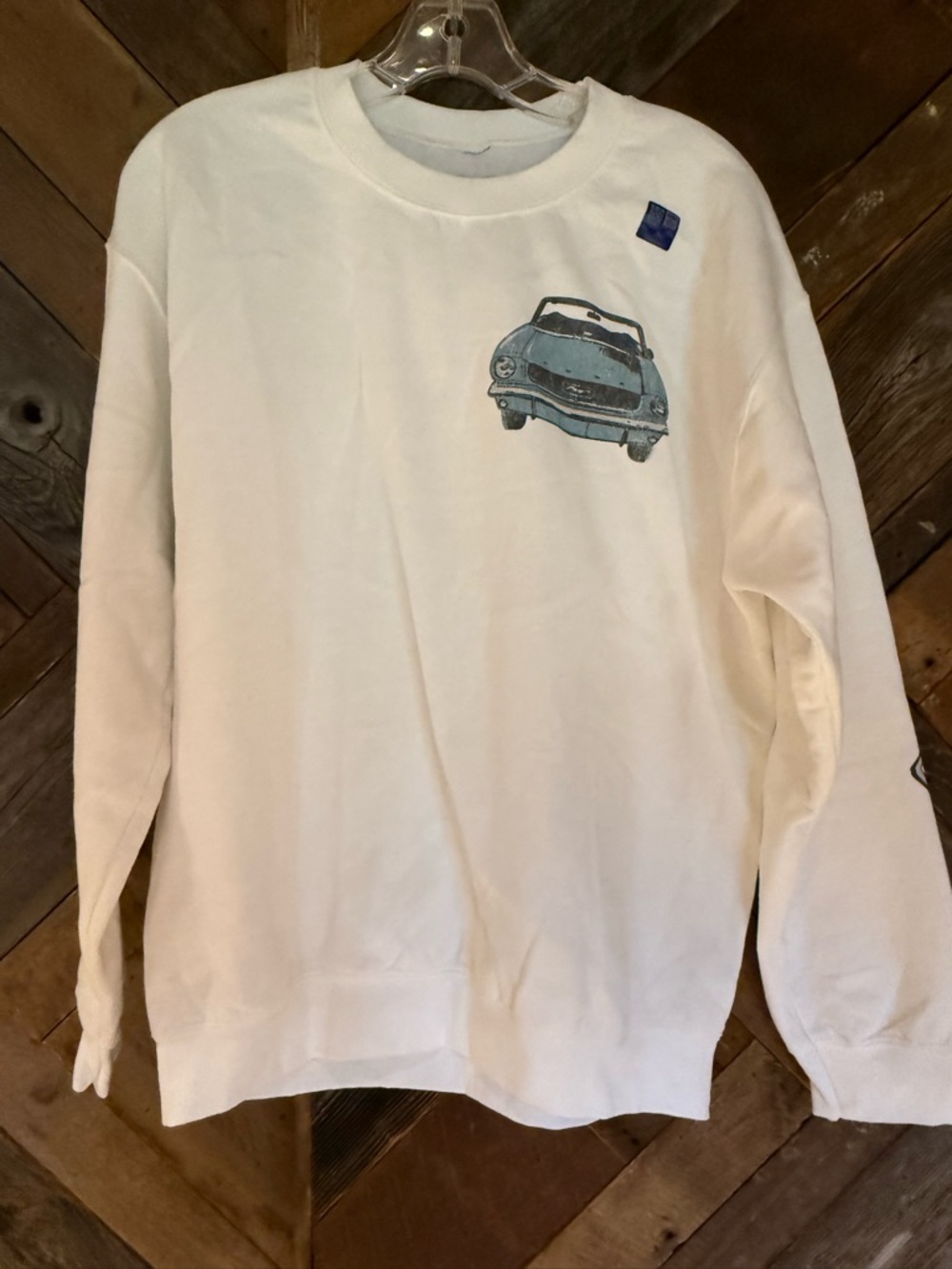 Ford Men's Cream Crewneck with Blue Car Graphic